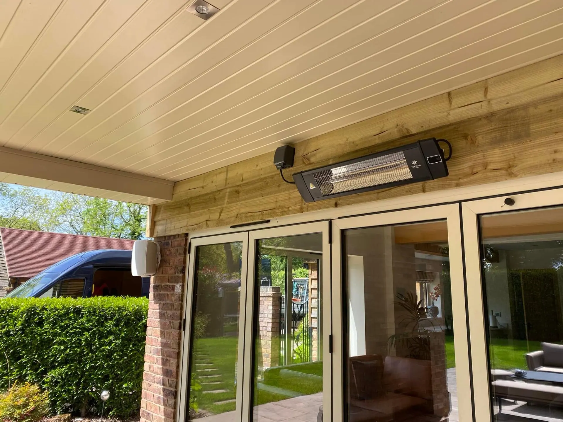 Herschel infrared patio heater under the terrace at Dingleside — JRC Developers