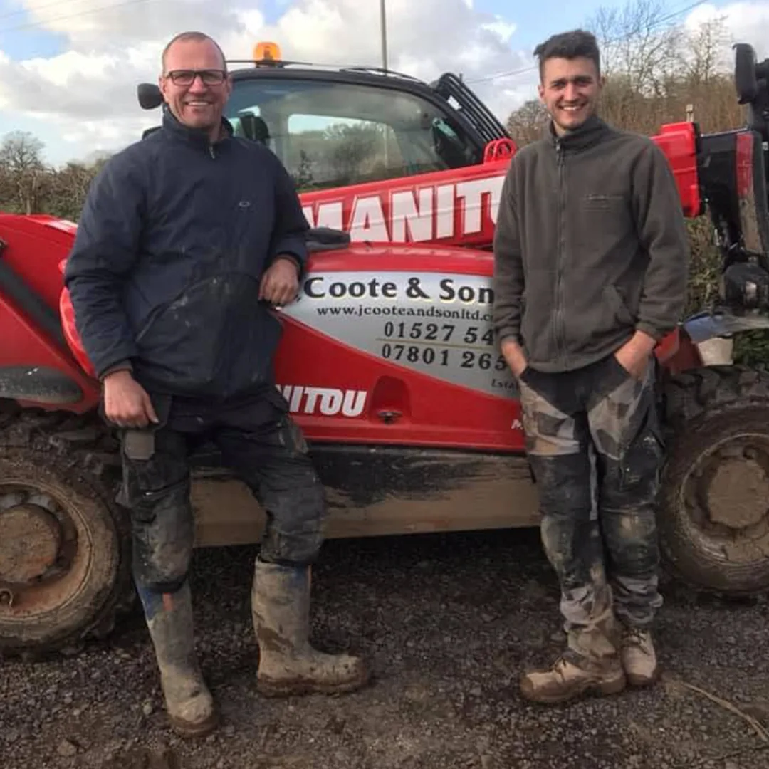John and Jack on site together beside the Manitou telehandler