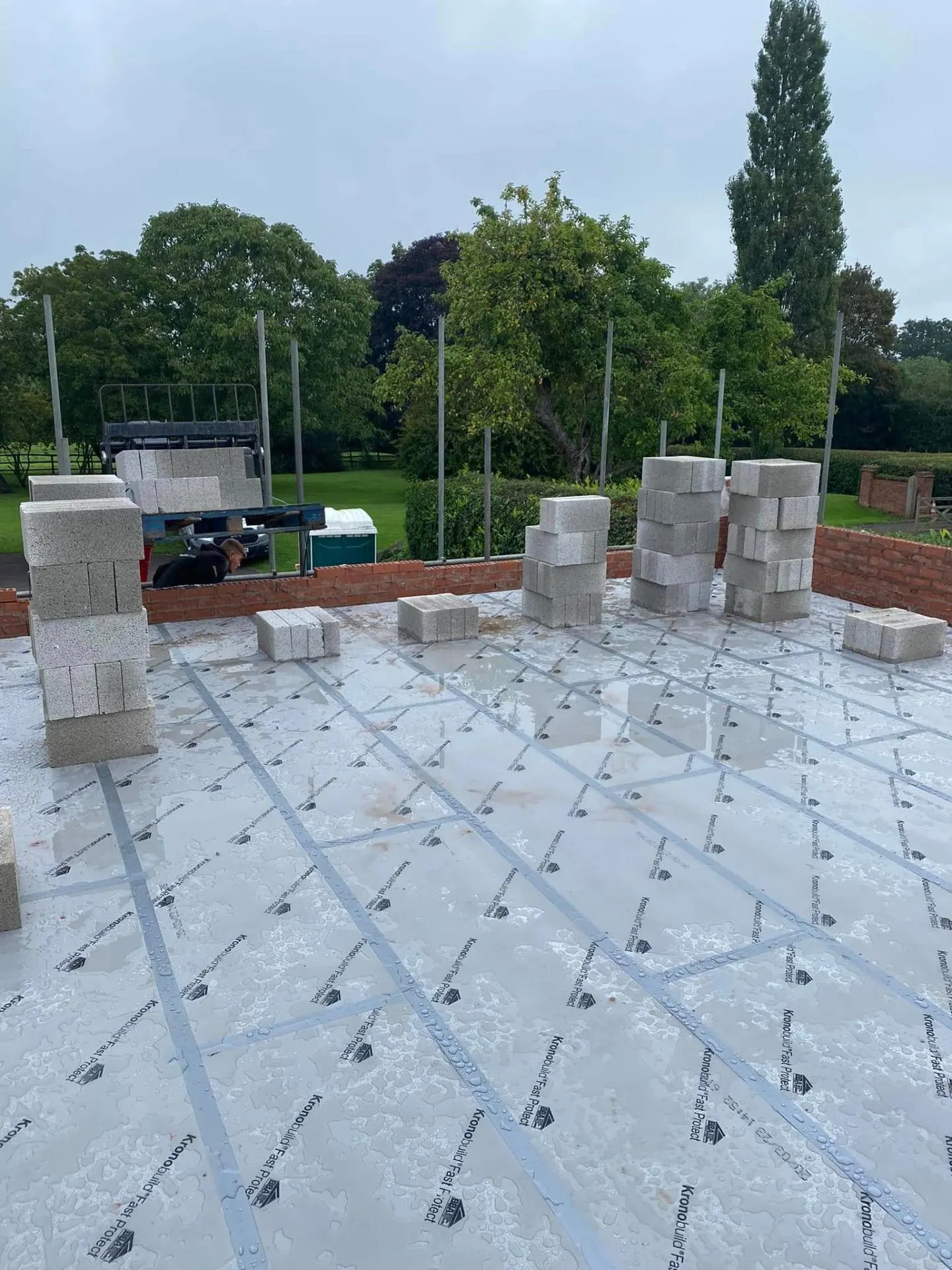 First-floor piers and structural steel columns on a two-storey extension by JRC Developers