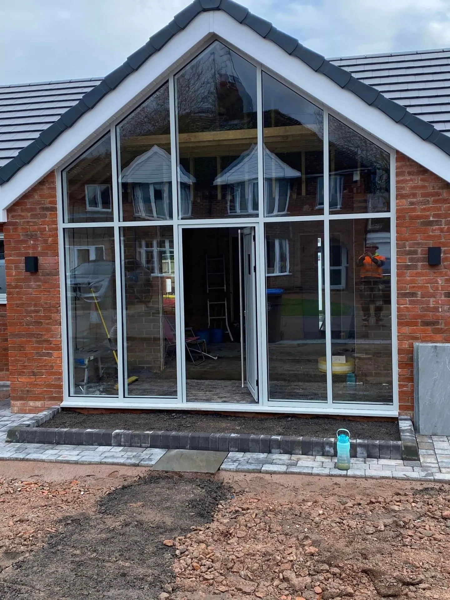 Full-height glazed gable being installed at White Gates