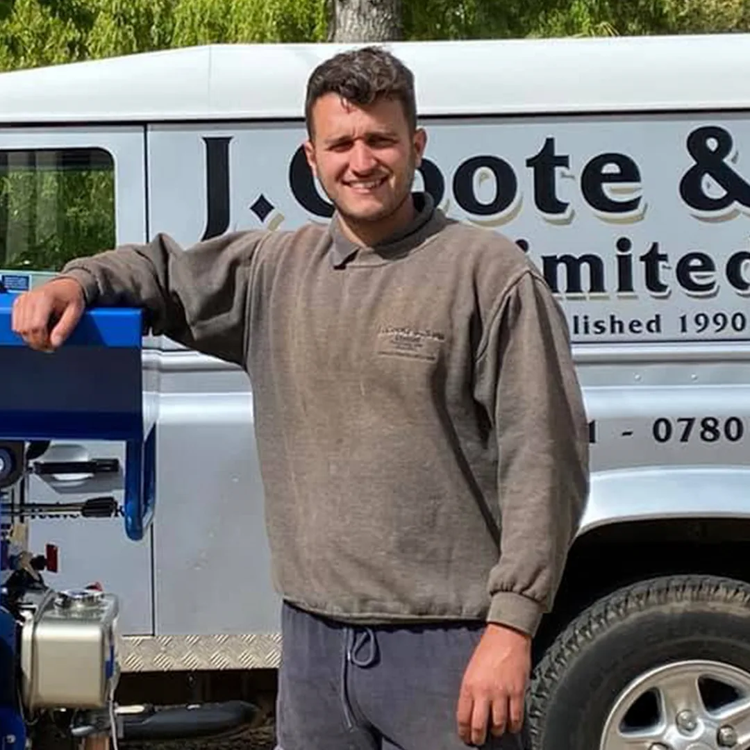 Jack on site in front of the J Coote & Son Limited van